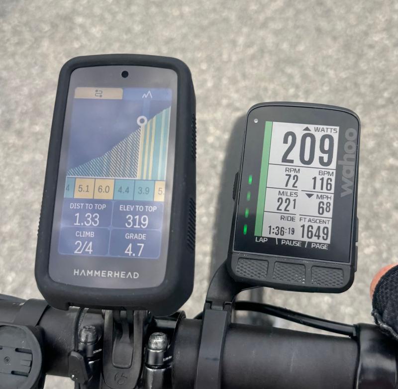 Climbing profile with distance on left  with elevation to go and %grade along the bottom.  And on right performance; Watts and HR upper right green stripe on left turns red when cars approach from behind..